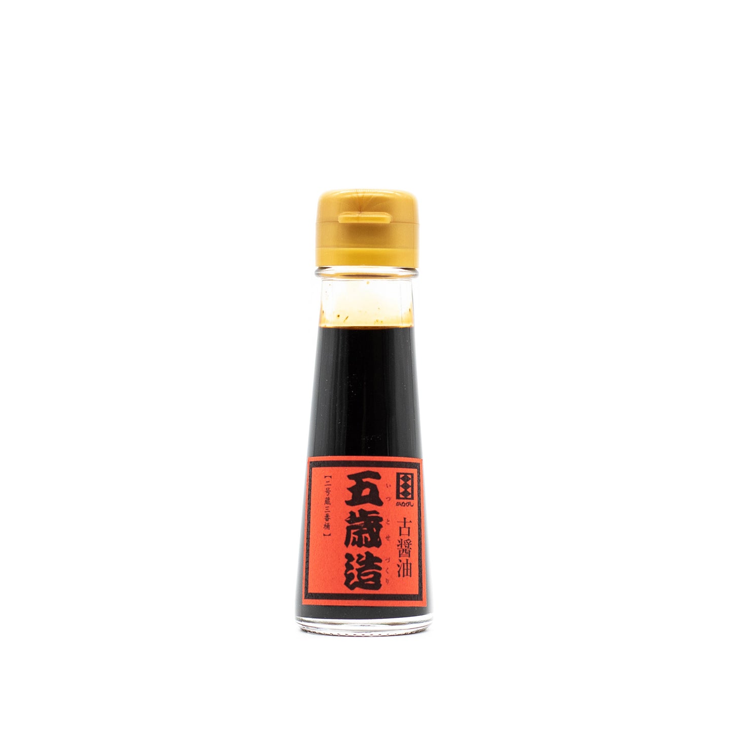 A glass bottle of 5 Year Aged Soy Sauce, matured in wooden barrels, features a yellow cap and a red label with Japanese text, shown on a white background.