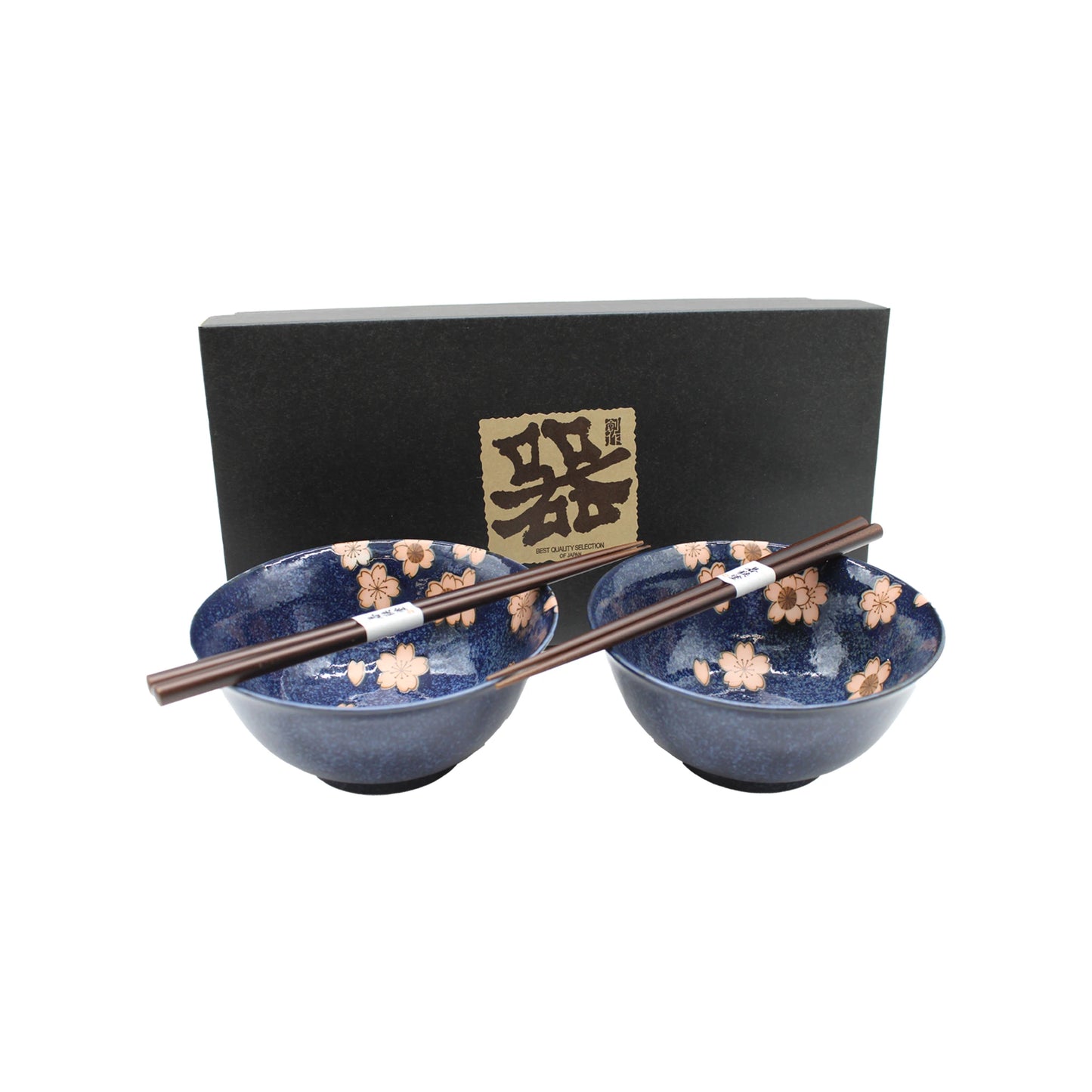 The Sakura Cherry Blossom Bowls Gift Set - Navy Blue & Pink features two Mino ware ceramic bowls with sakura patterns and chopsticks, displayed before a sleek black box with gold Japanese writing.