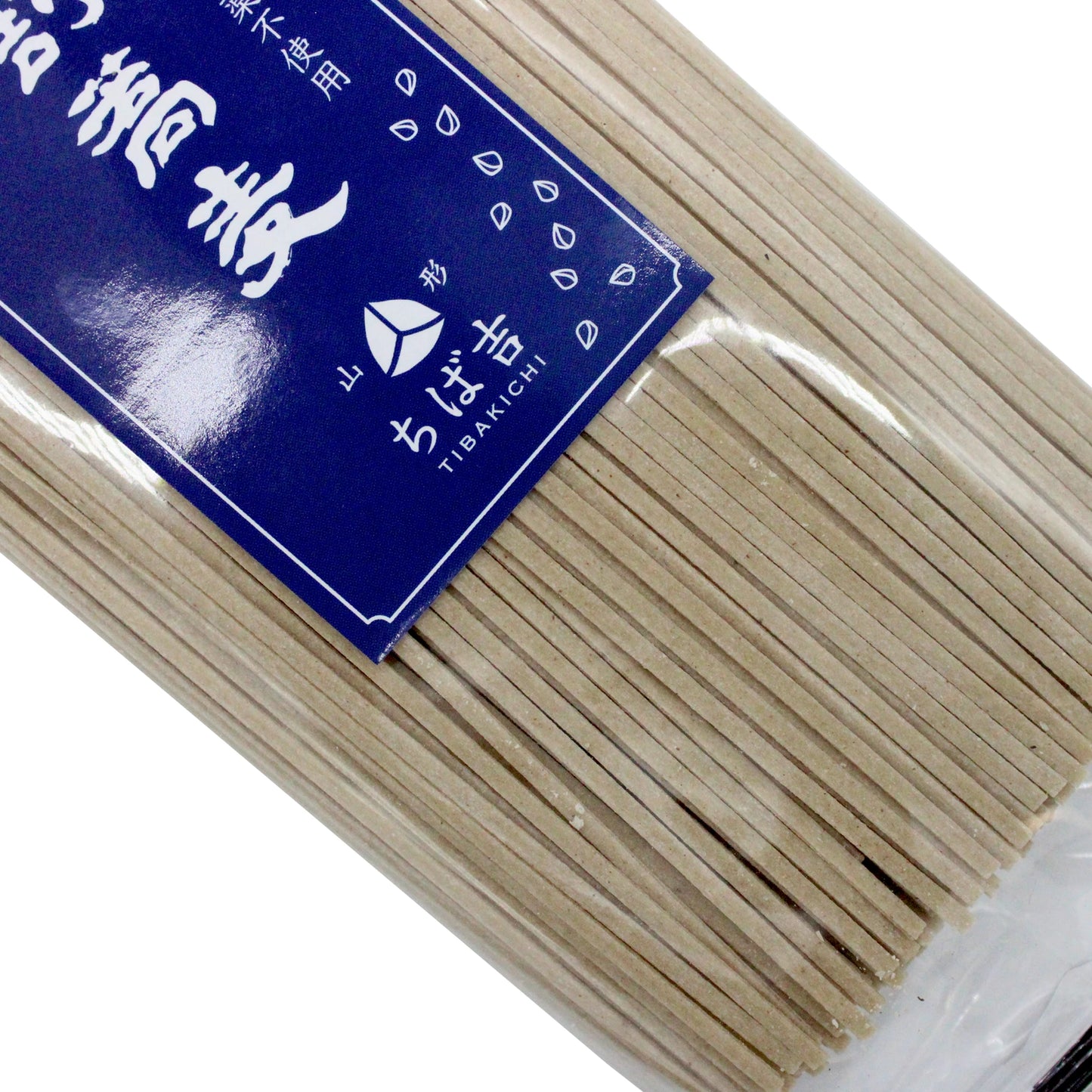 A close-up of a 200g package of Chibakichi Gluten Free Soba Noodles, featuring uncooked noodles and a blue and white label with Japanese text.