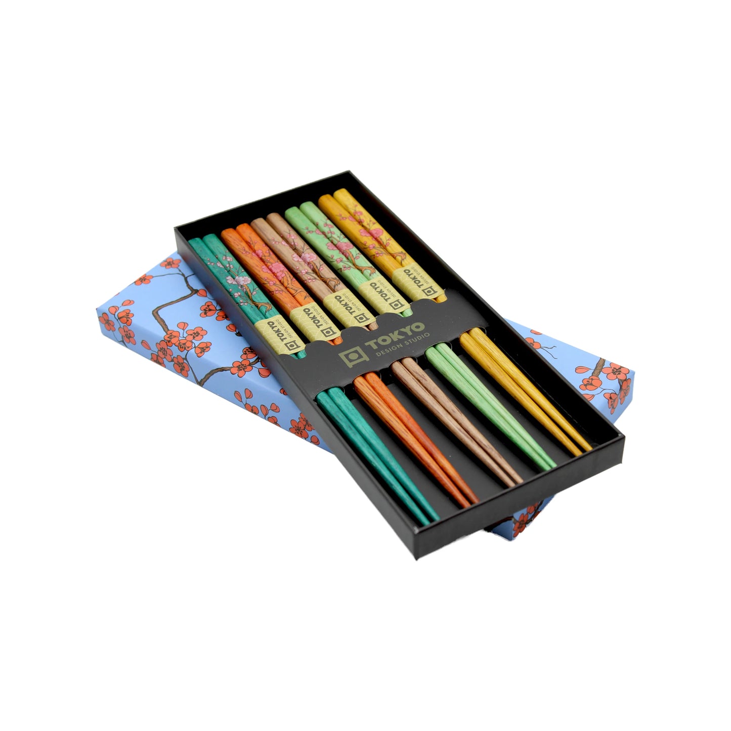 A pack of 5 chopsticks with a Sakura design, arranged neatly on blue cherry blossom-patterned paper by Tokyo Design Studio.