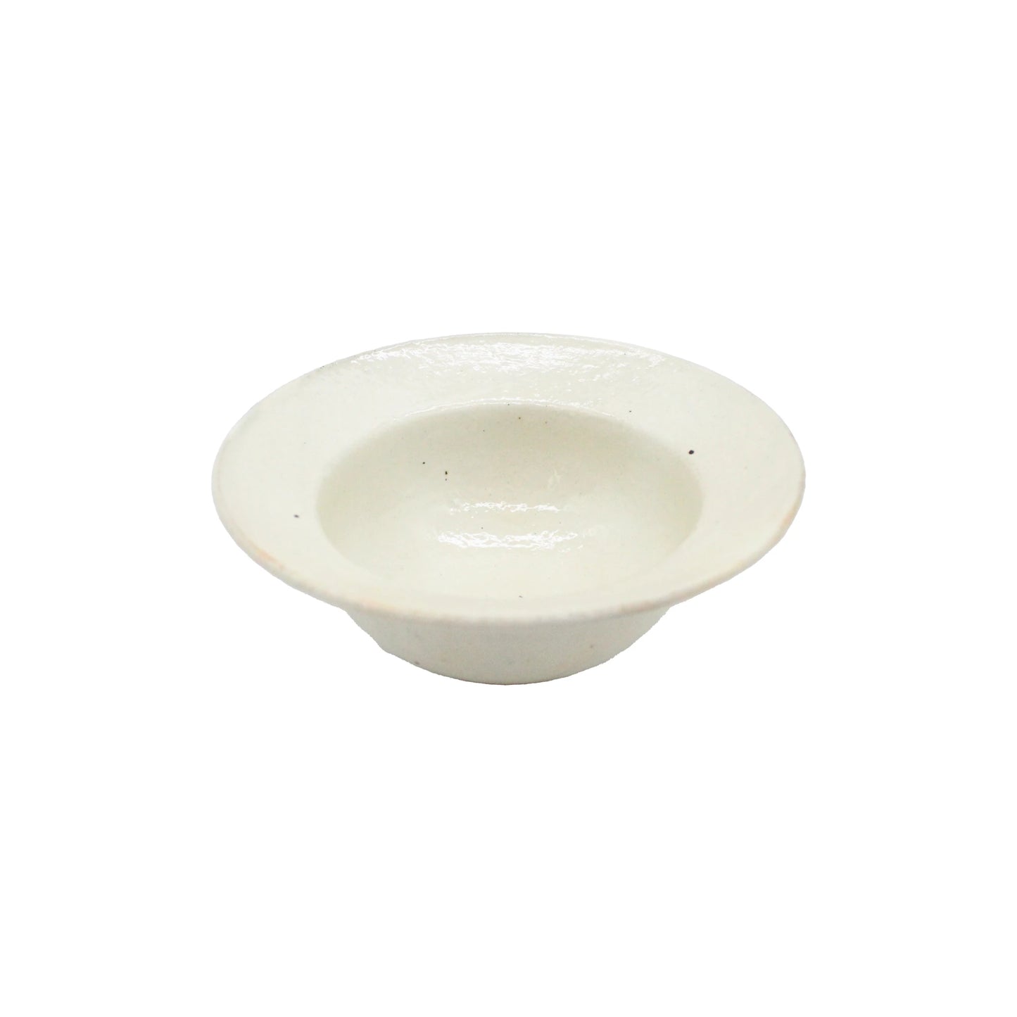 A small Japanese ceramic bowl named "Rim Bowl - Iron Scatter," featuring a wide rim, is photographed against a white background.
