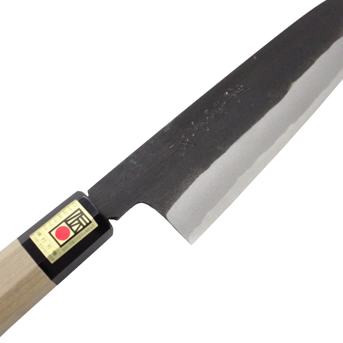The Gyuto Chef’s Knife Black Forged - 240mm features a double-bevel edge, wooden handle, and a sharp, dark metal blade engraved with Japanese characters.