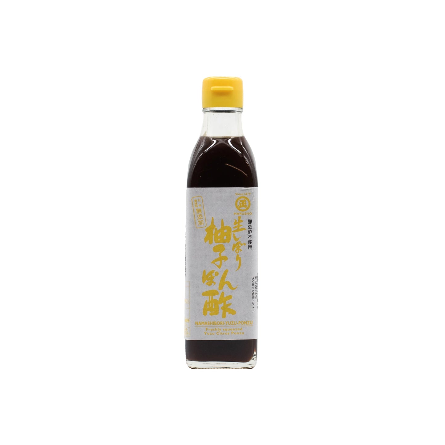 A bottle of Namashibori Yuzu Ponzu with a yellow cap and white Japanese label sits against a white background, highlighting the refreshing tang of yuzu juice and the sauces signature umami flavor.