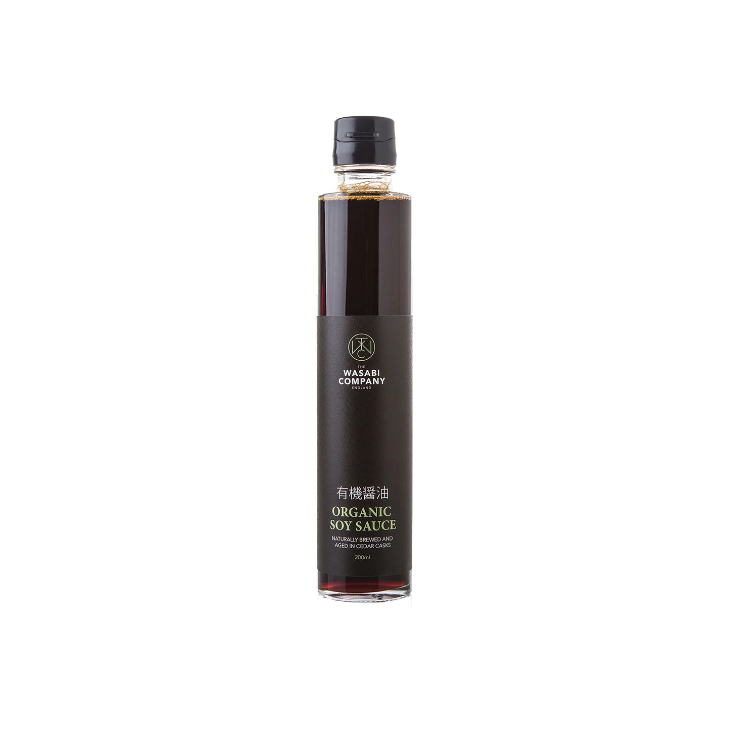 A clear glass bottle of Organic Soy Sauce - 200ml with a black label and black cap is photographed on a white background.