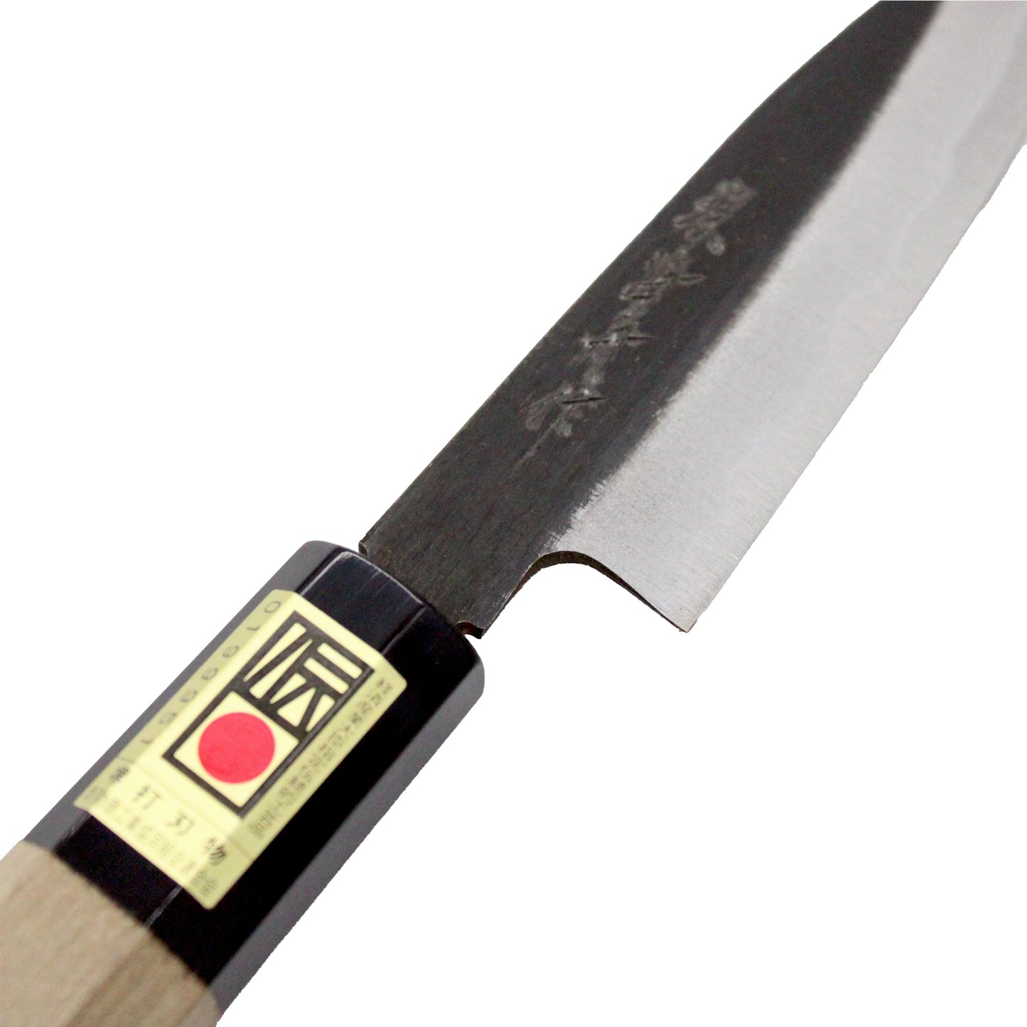 Close-up of the Petty Paring Knife Double Bevel Black Forged - 105mm, showing its wooden handle, engraved blade, hand-sharpened double-bevel edge, Japanese text label, and a red circle near the handle.