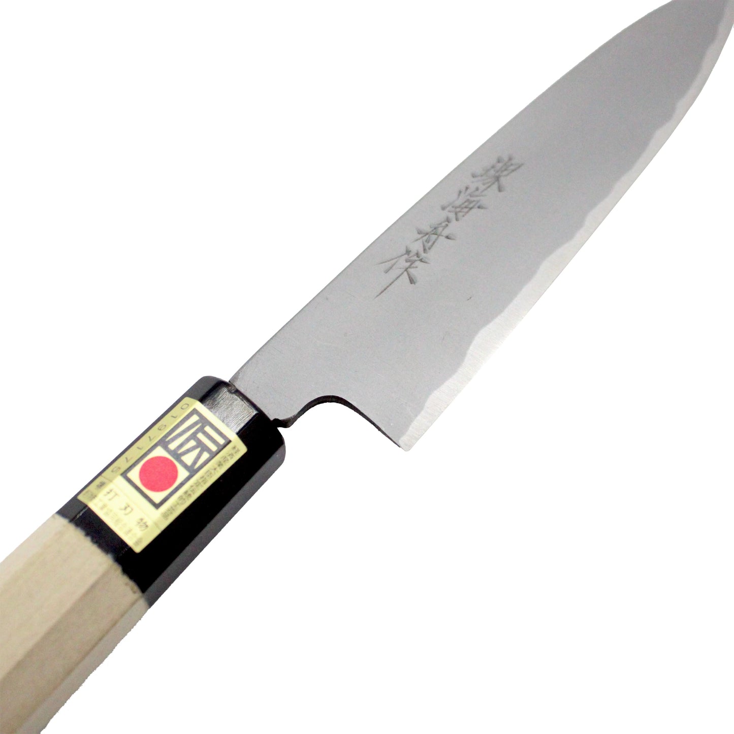 The Petty Paring Knife Migaki Polished - 150mm, featuring a wooden handle and engraved white steel blade, is displayed against a white background.