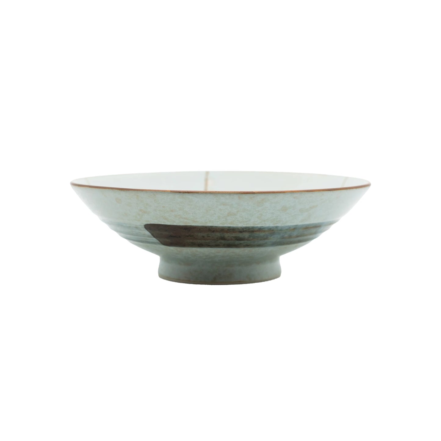 The Ramen Bowl - Light Blue Cherry Blossom is a shallow, round Minoyaki porcelain bowl with a wide rim, narrow base, and light blue glaze accented by subtle dark tones.