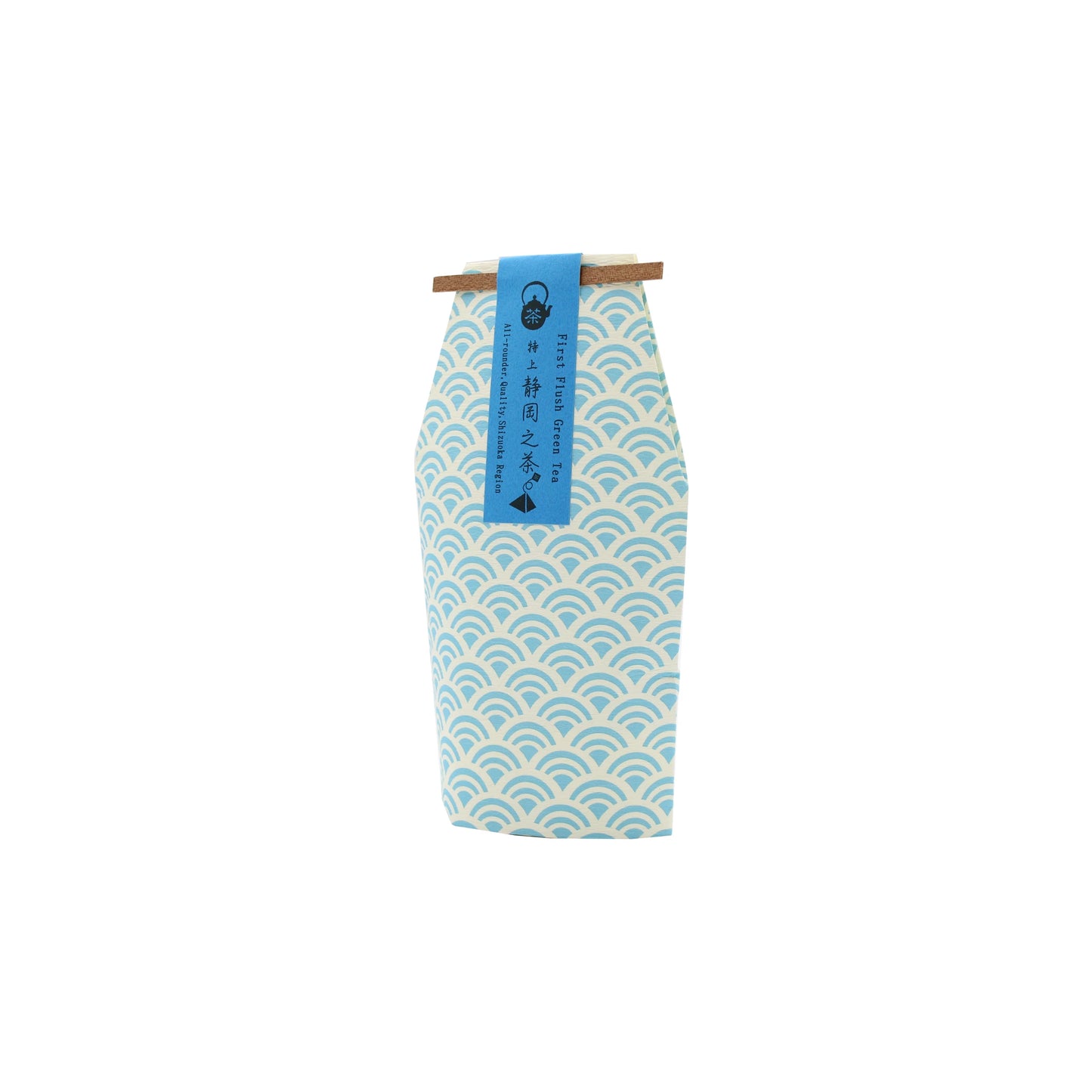 A patterned blue and white package with a blue label and Japanese text contains Sencha First Flush Green Tea (7 bags, 21g), made from Camellia sinensis, closed at the top with a wooden clip, set against a white background.