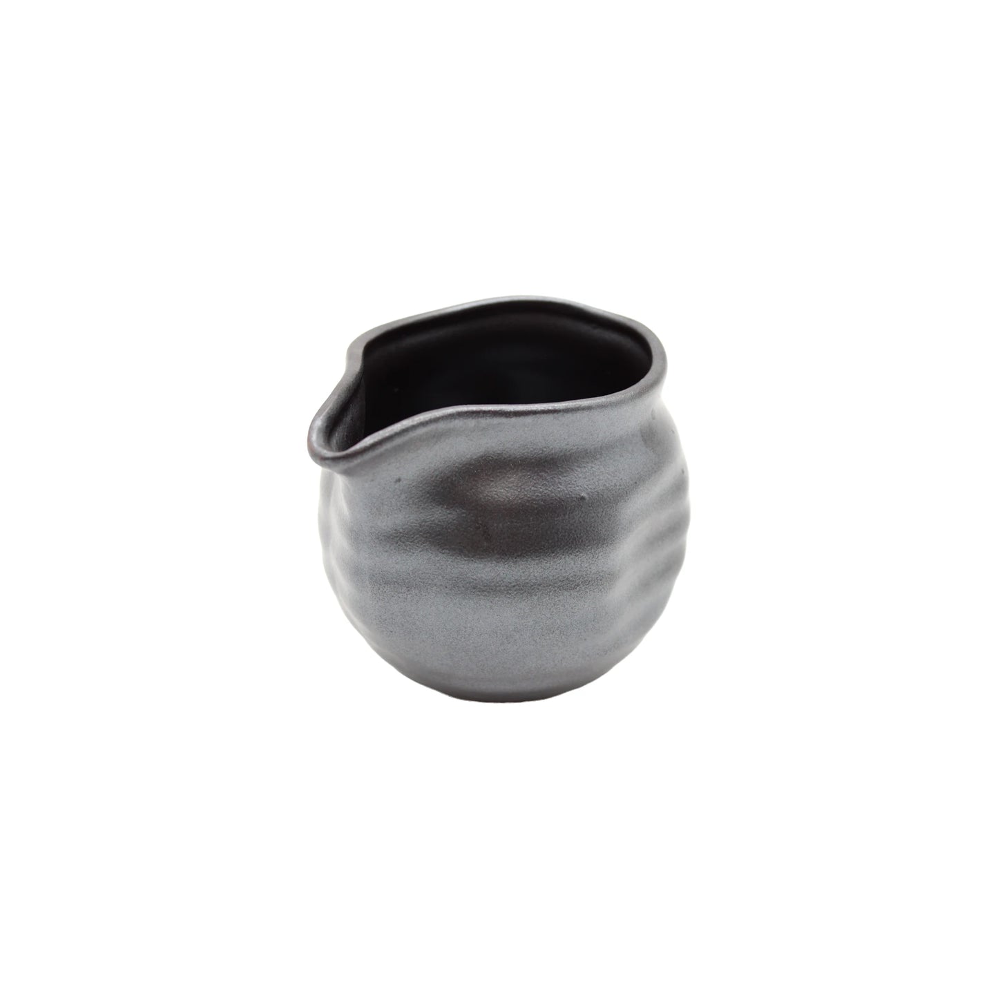 The Soy Sauce Pourer - Silver and Black is a small, round ceramic pitcher with a wavy surface and spout, highlighting Japanese craftsmanship against a white background.
