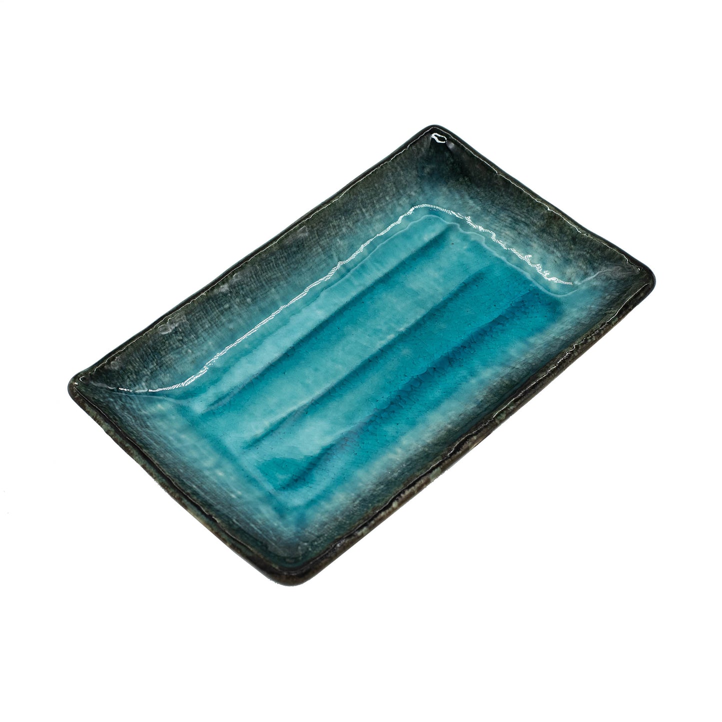 The Sushi Plate Sky Blue is a rectangular Minoyaki porcelain plate with a glossy blue and teal gradient, slightly raised edges, and a textured surface—showcasing Japanese craftsmanship.