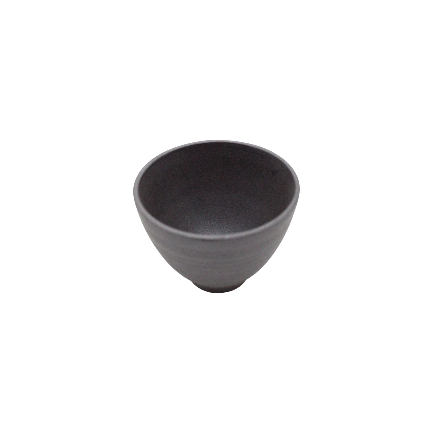 The Tea Cup - Hasamiyaki Kurosendan Black, a small, round matte gray teacup with a minimalist design, sits on a white background and showcases the refined elegance of Japanese ceramic craftsmanship.
