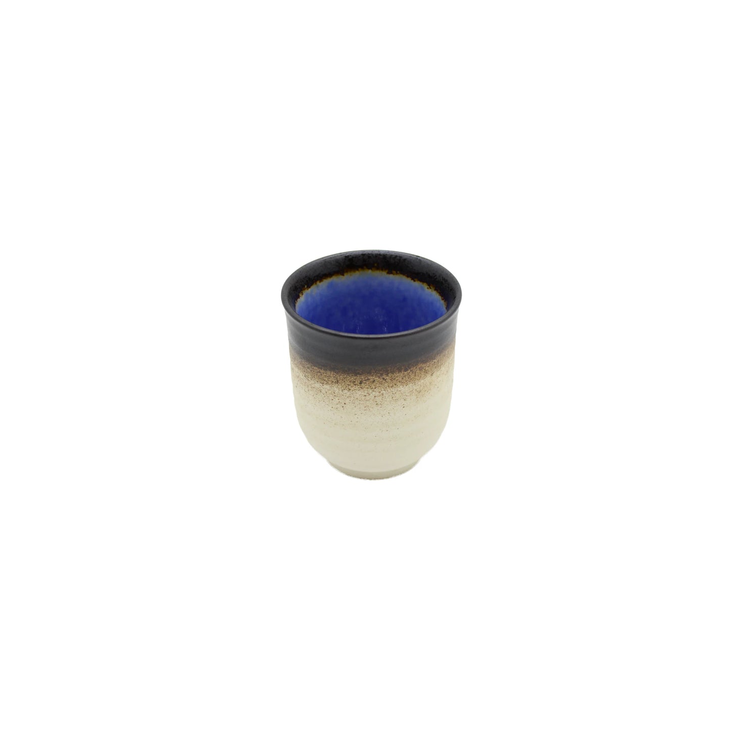 The Tea Mug - Cobalt Blue features Minoyaki porcelain craftsmanship with a gradient: dark rim, brown middle, and off-white base. Its interior showcases a vibrant cobalt blue, blending Japanese tradition with modern style.
