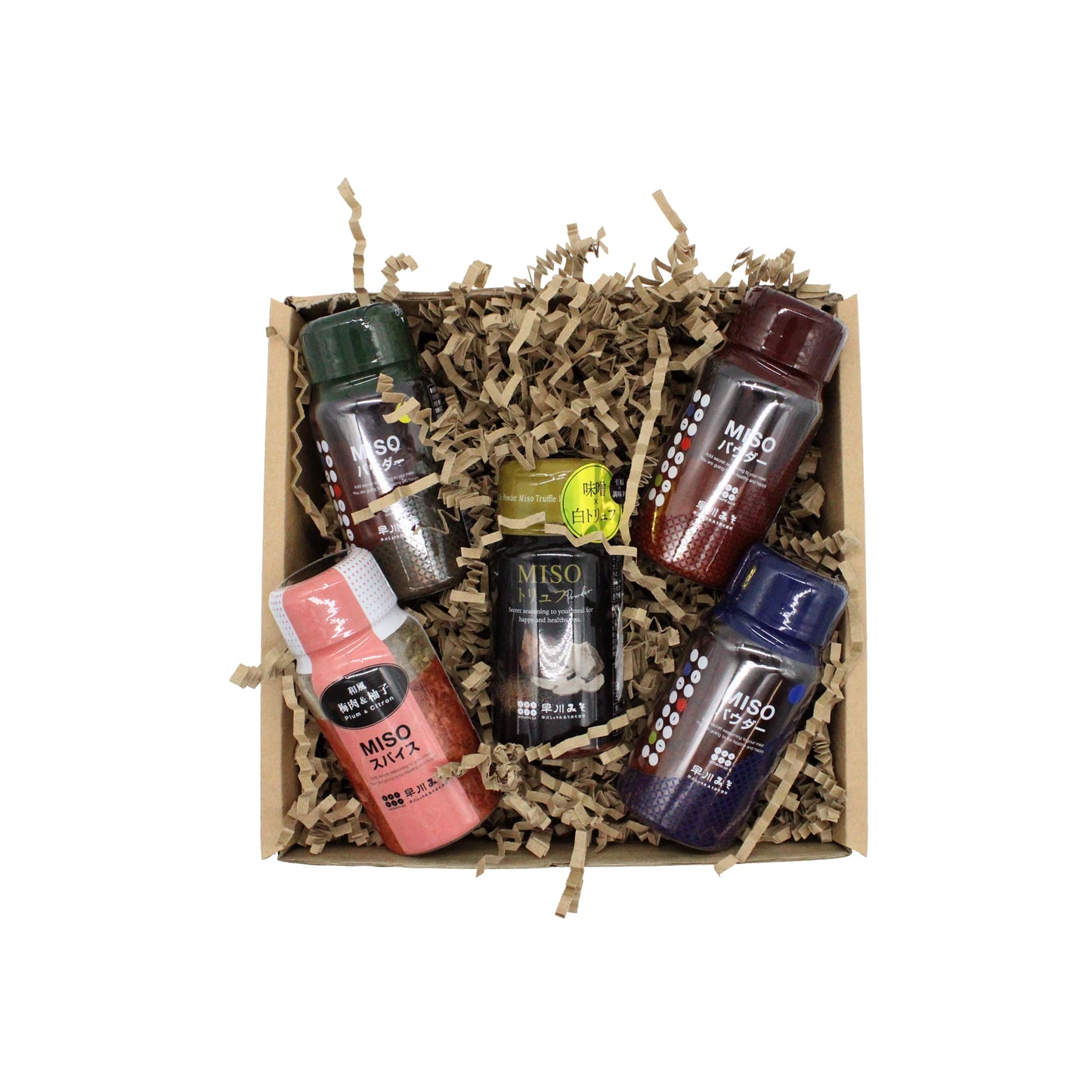 The Umami-so Seasoning Set includes five assorted bottles of miso paste, a must-have for Japanese cooking, beautifully arranged on shredded brown paper.