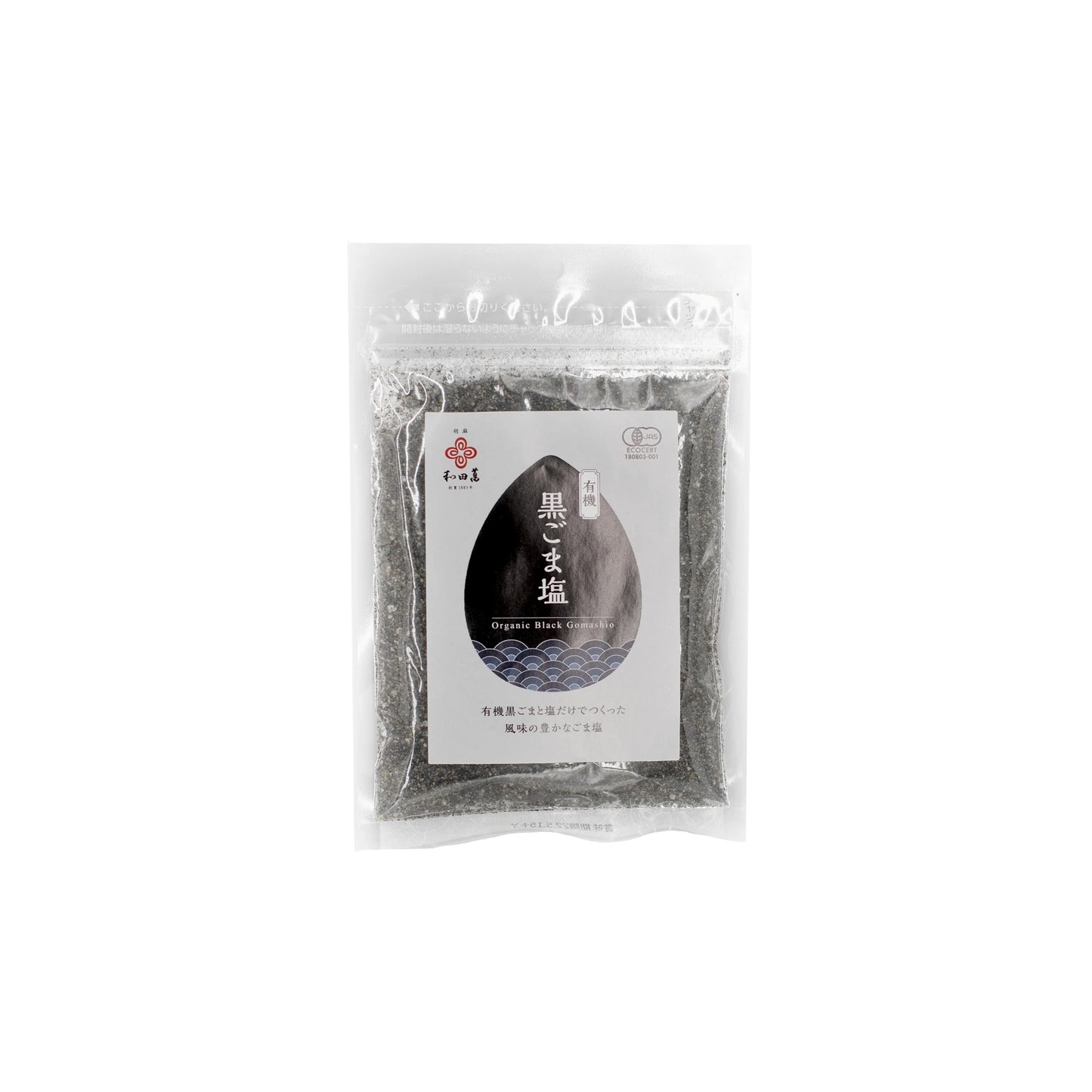 Wadaman Gomashio - 50g comes in a clear pouch with Japanese labels, featuring organic black sea salt. Ideal for boosting flavor in dishes or pairing with black sesame seeds.