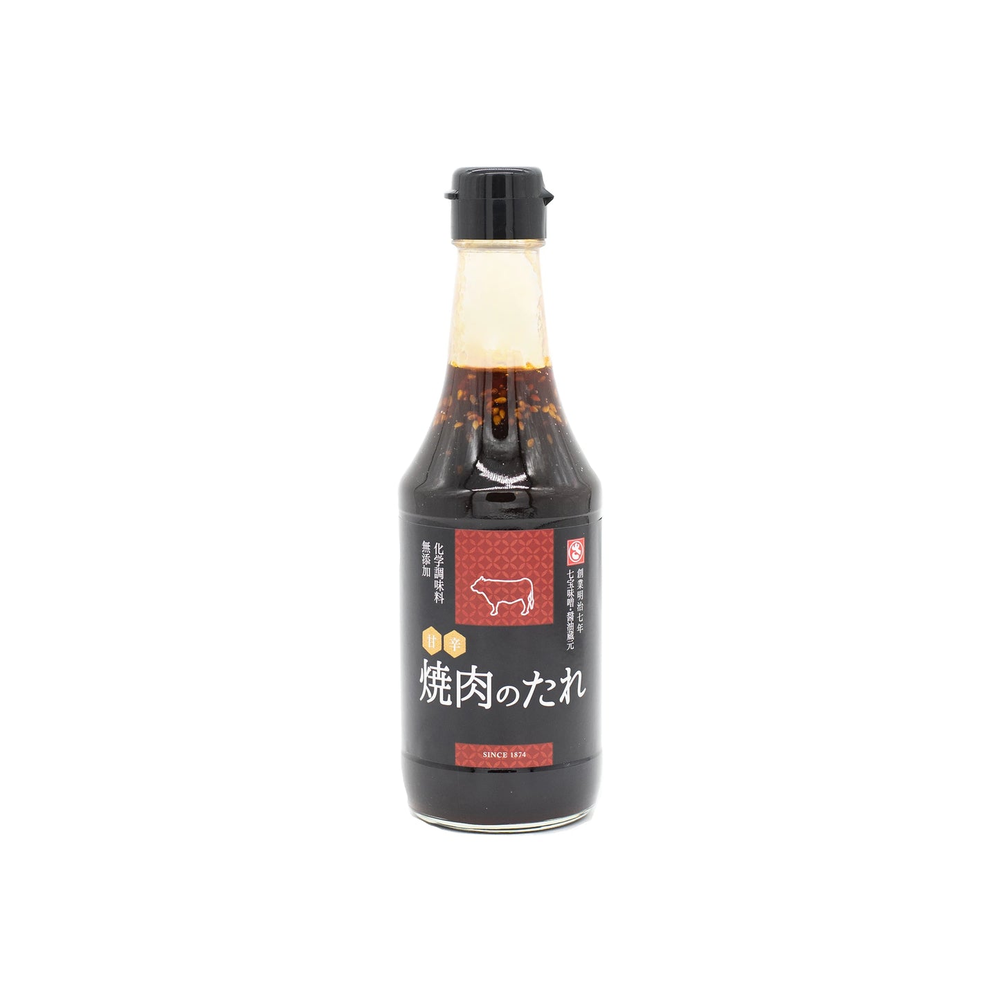 Yakiniku Barbecue Sauce - 300ml comes in a bottle with a black cap, featuring Japanese text, a cow illustration, and visible sesame-flavored sauce—ideal for elevating your Japanese cuisine experience.