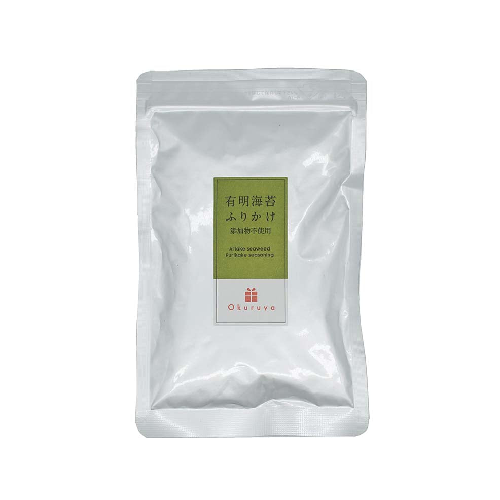 A sealed white pouch labeled Furikake with Ariake Nori & Sesame - 50g features Japanese text and a red Okuruya logo—the classic Japanese seasoning blend of savory sesame seeds and premium Ariake seaweed.