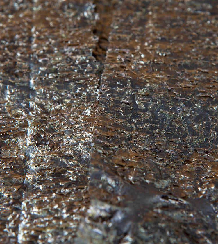 Close-up of overlapping Sanpuku Non-Roasted Nori - 10 Sheets, highlighting their shiny, crinkled texture.
