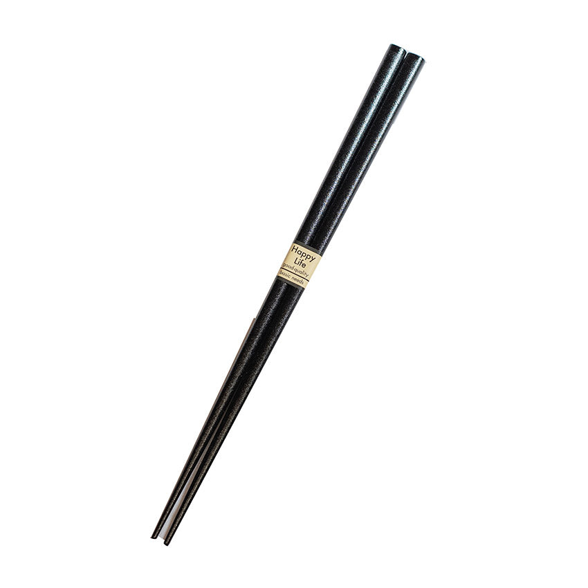 A pair of Chopsticks - Black from Zumi Workshop, featuring a small beige label at the top, crafted in classic lacquerware style and displayed on a white background.