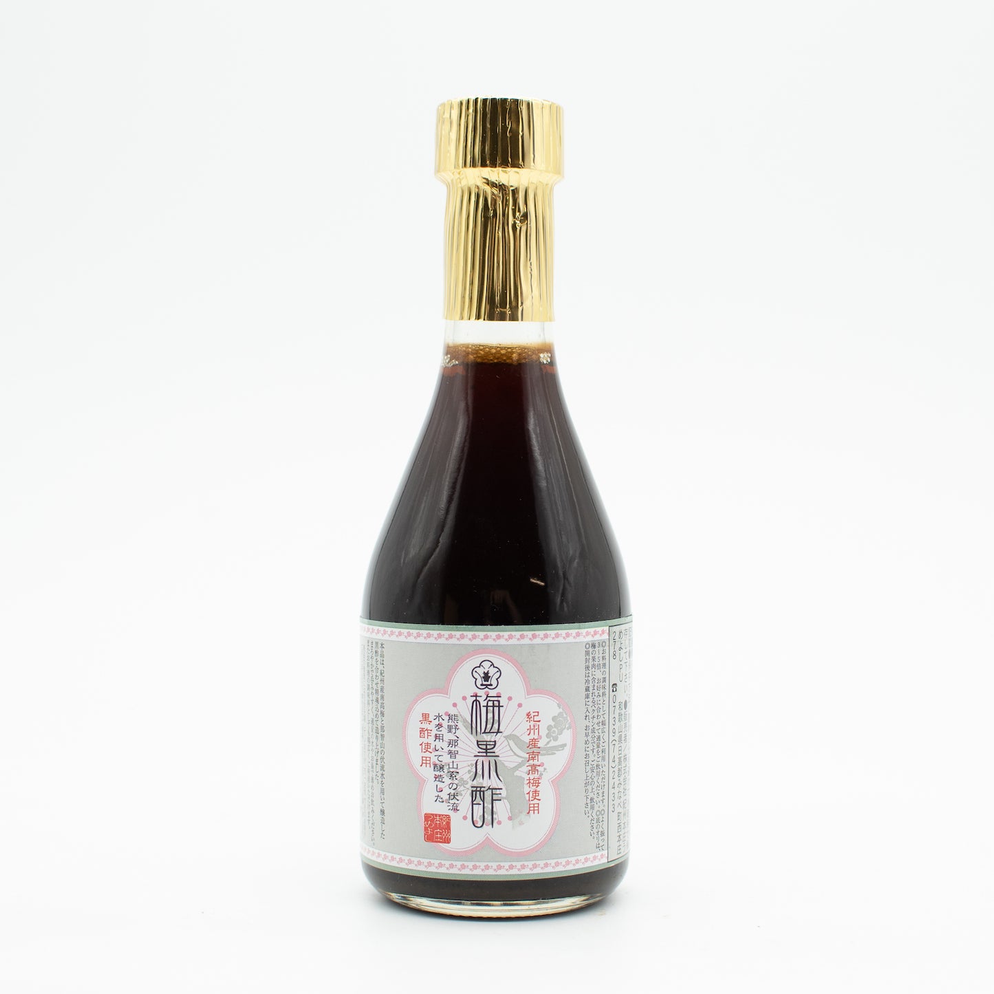 A 290ml bottle of Dark Ume Plum Vinegar with a gold foil cap and a white label featuring Chinese characters, displayed against a plain white background. This specialty is known for its rich and complex flavor.