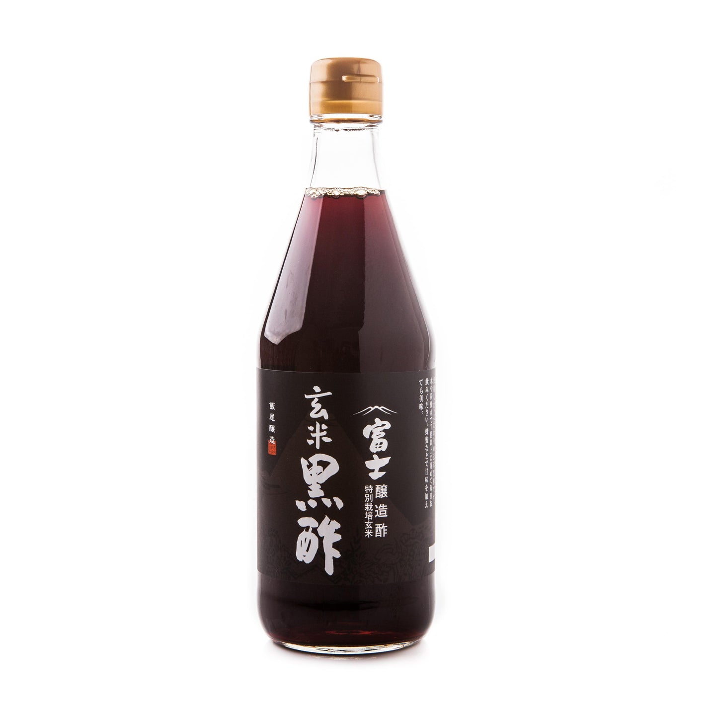 A 500ml glass bottle with dark liquid, a brown cap, and Japanese text—Genmai Fuji Black Rice Vinegar, authentically crafted by Iio Jozo.