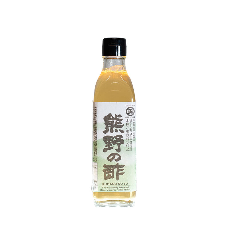 A clear glass bottle with a black cap contains Kumano No Su Rice Vinegar with Mirin. It has a white label with Japanese and English text, perfect for seasoning sushi rice.