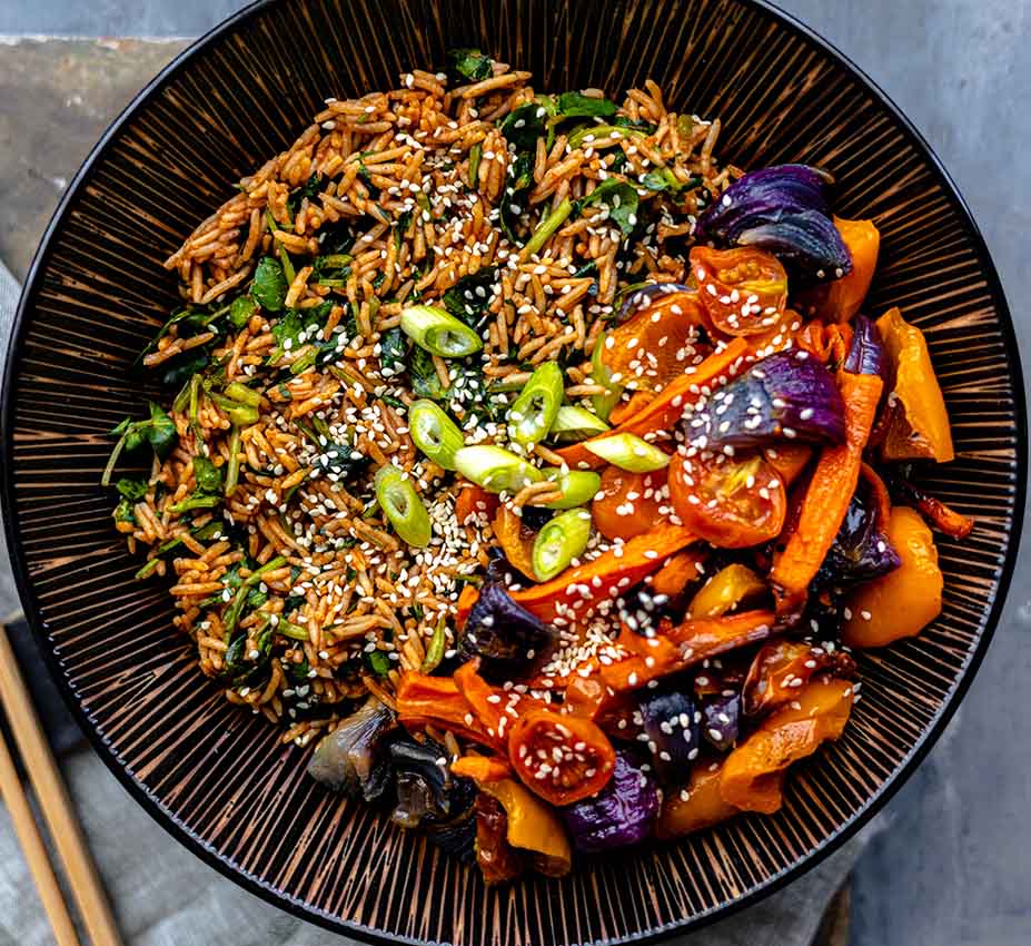 The Ramen Bowl - Bronze is handmade and perfect for serving brown rice, sautéed greens, and colorful roasted vegetables, topped with sesame seeds and sliced green onions.