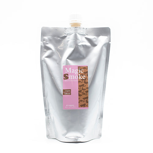 A silver refill pouch of Sakura Cherry Tree Liquid Smoke with a white screw cap stands upright on a white background, evoking the delicate aroma of smoked cherry.