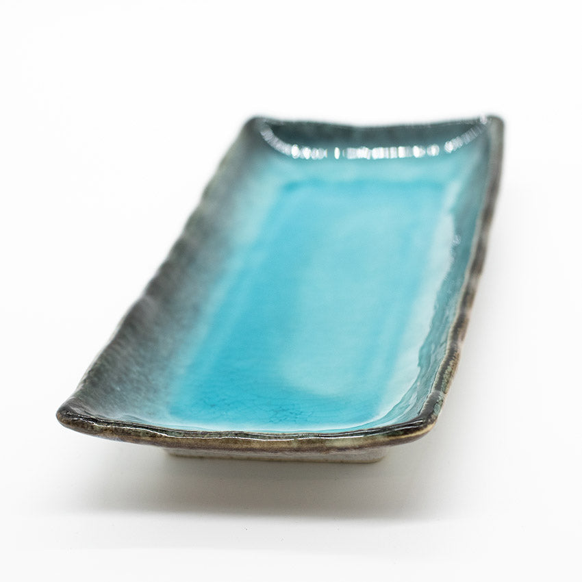 Sky Blue Sashimi Plate: rectangular Minoyaki porcelain dish with a glossy sky blue interior and textured, dark-edged rim, perfect for serving sashimi. Shown on a white background.