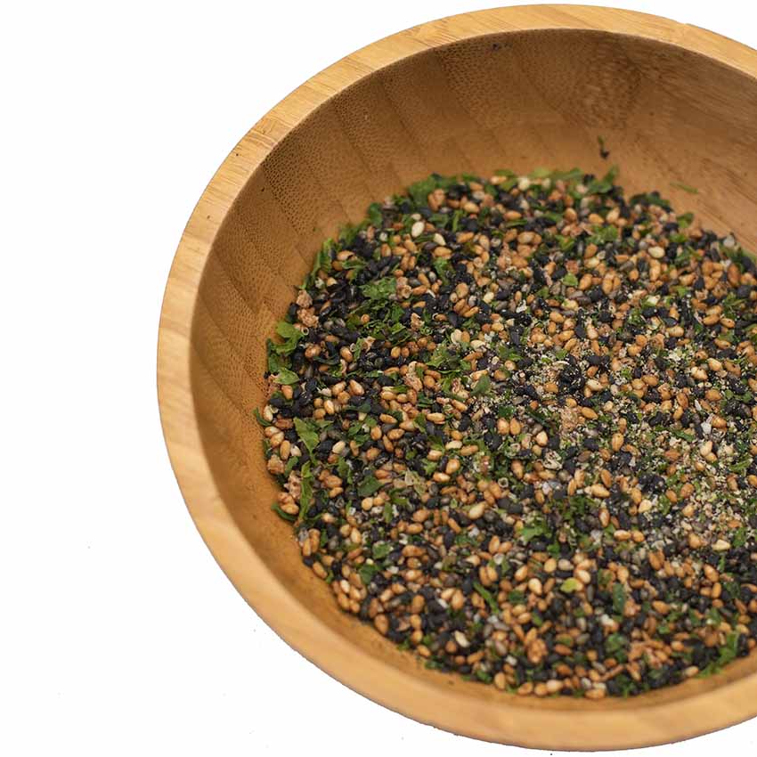 Wadaman Furikake Sesame & Ume 30g combines black and white sesame seeds, dried green herbs, ume plum, and savory seasonings for a vibrant furikake-inspired blend.