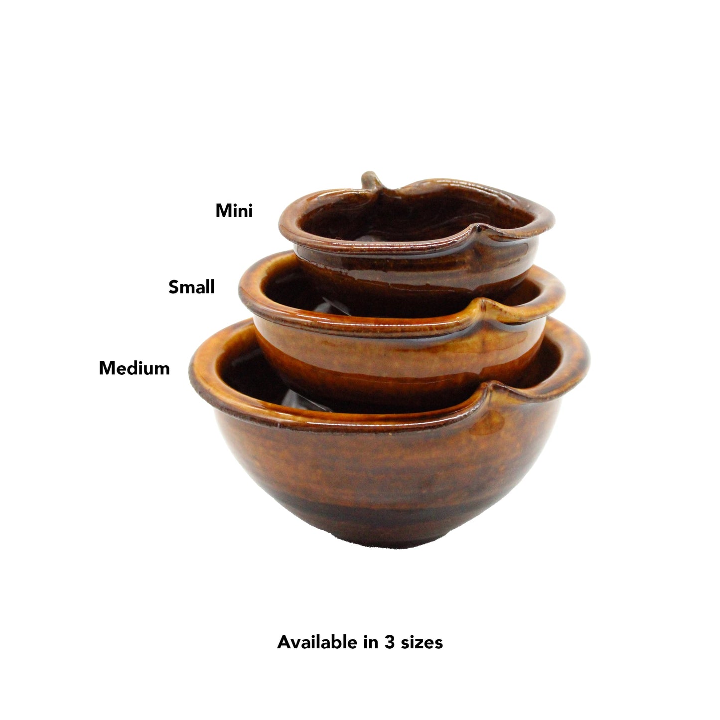 Three brown Apple Bowls - Candy Glaze, labeled Mini, Small, and Medium, are stacked together. Crafted in the shape of apples, these Japanese pottery bowls come in three sizes.