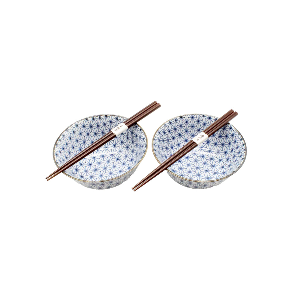 
                  
                    The Asanoha Bowls Gift Set - Blue & White includes two ceramic Japanese bowls with geometric patterns, each paired with a set of dark brown wooden chopsticks resting on top.
                  
                