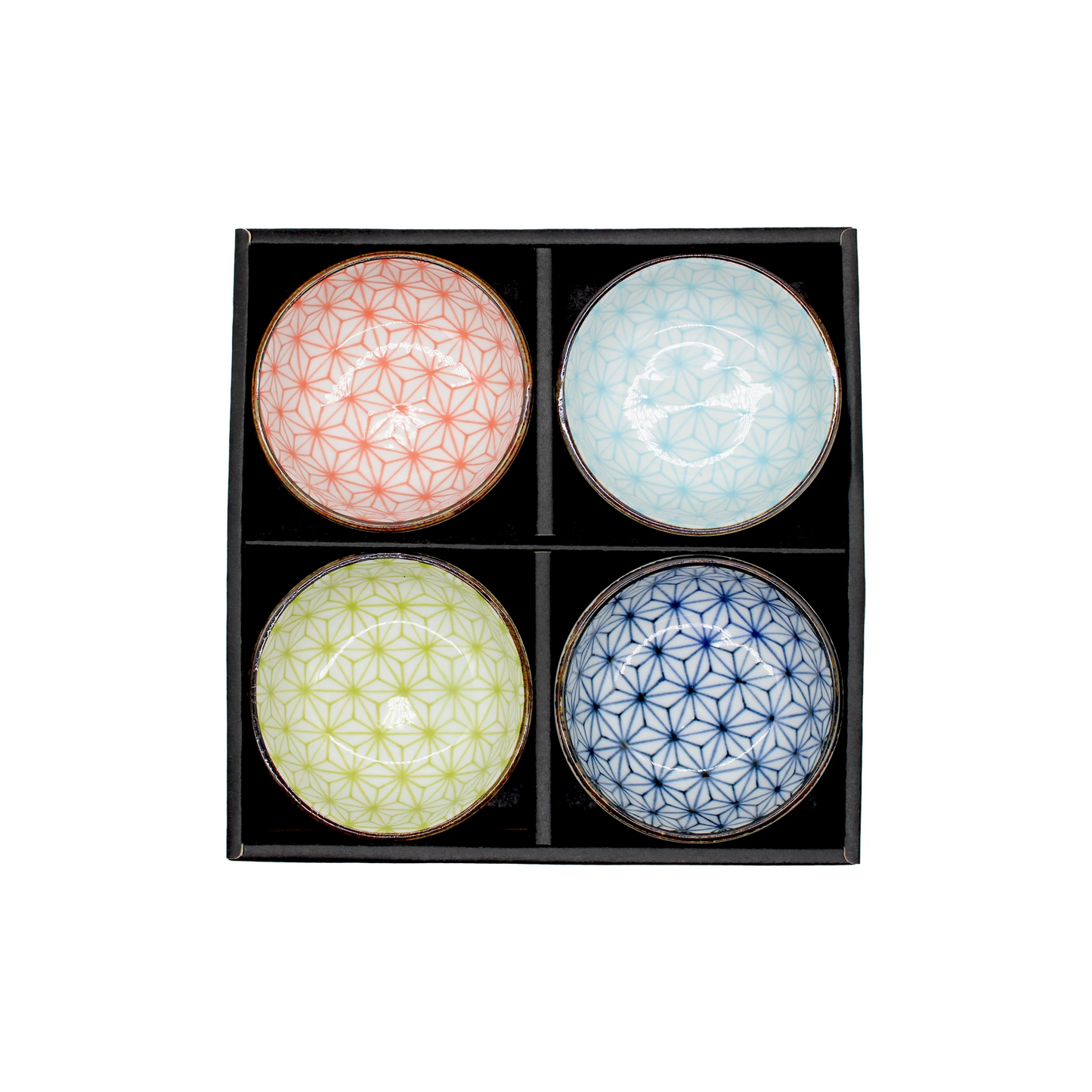 The Asanoha Design Sauce Dish Gift Set - 9cm features four Minoyaki ceramic bowls with geometric patterns in red, light blue, yellow-green, and blue, beautifully arranged in a black box—a striking example of Japanese artistry.