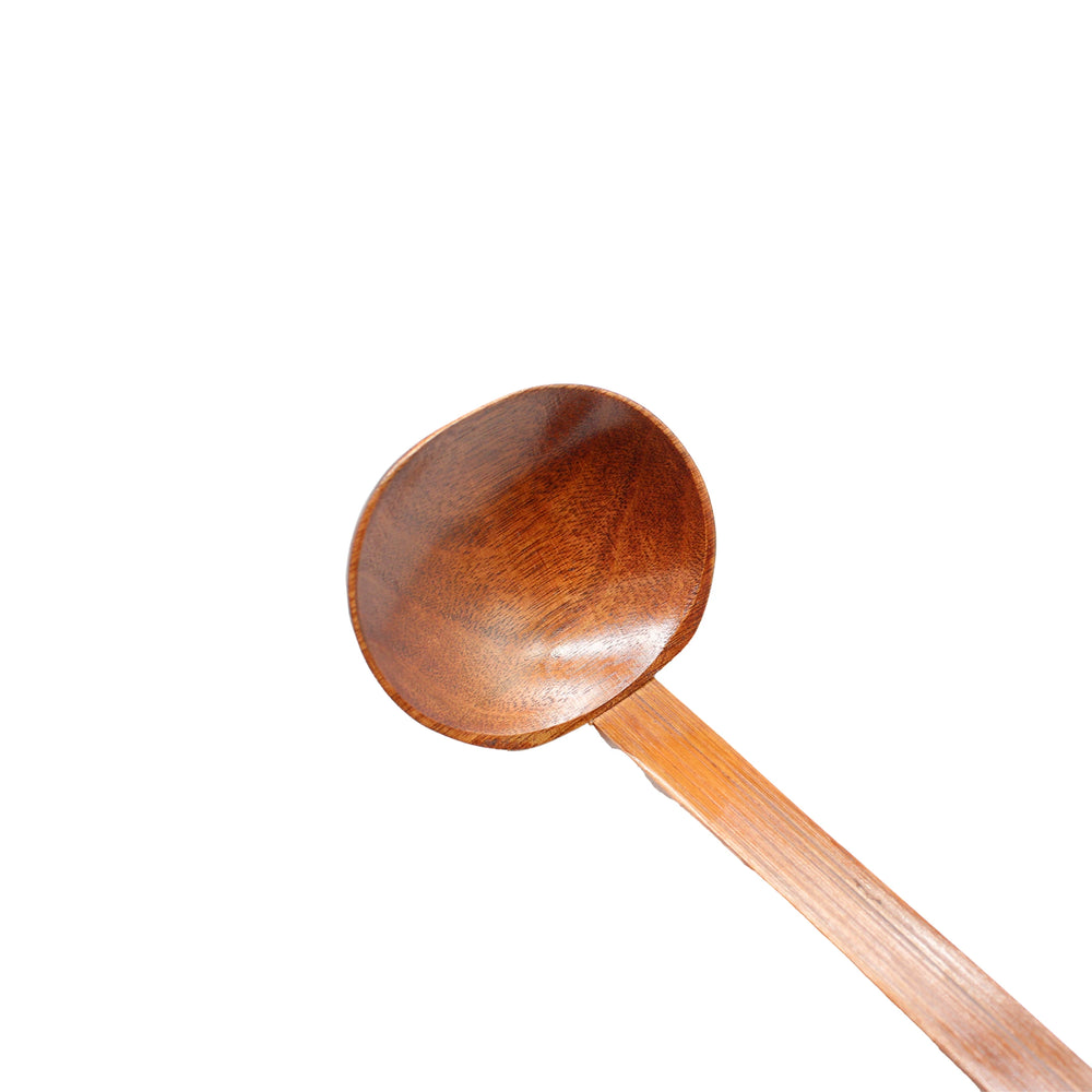 The Bamboo Ramen Spoon features a round, shallow bowl and a long handle, crafted from sustainable bamboo and shown against a white background.