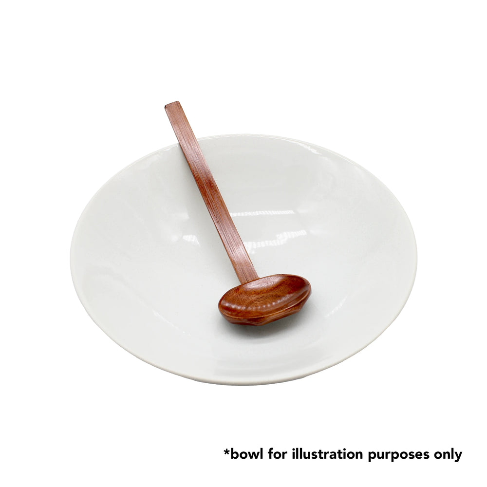 
                  
                    A Bamboo Ramen Spoon rests inside a plain white bowl on a white background, ideal for enjoying noodle soups; text at the bottom states, *bowl for illustration purposes only.
                  
                