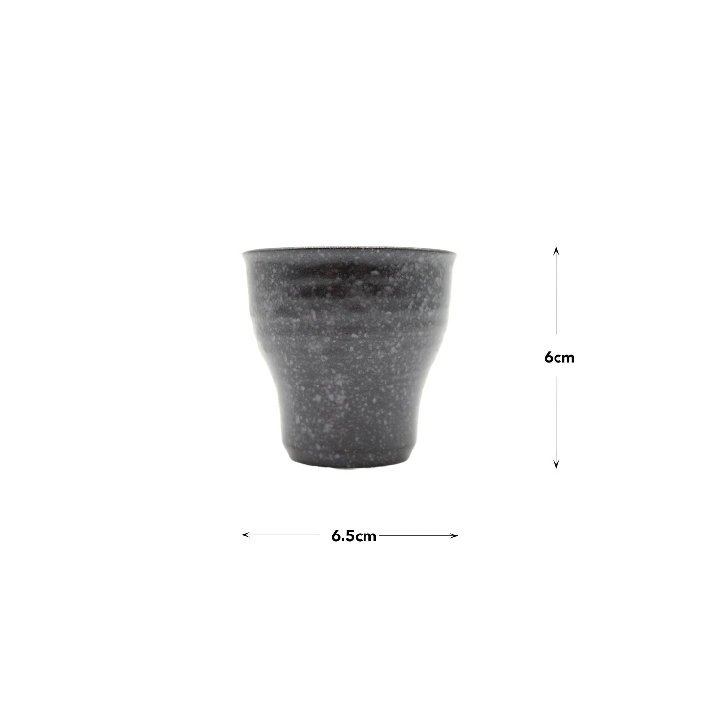 The Tea Cup - Black Fluted, an artisan porcelain teacup with dark speckles, measures 6 cm high and 6.5 cm wide. It is displayed on a white background with measurement arrows.