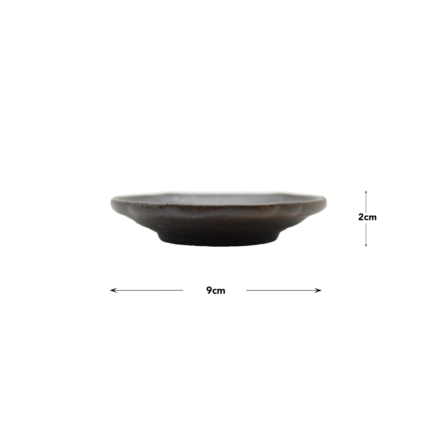 The Soy Sauce Dish - Black Iga Vortex is a small, shallow black dish with a vortex design, shown side-on. It measures 9 cm wide and 2 cm tall, with arrows marking its dimensions.