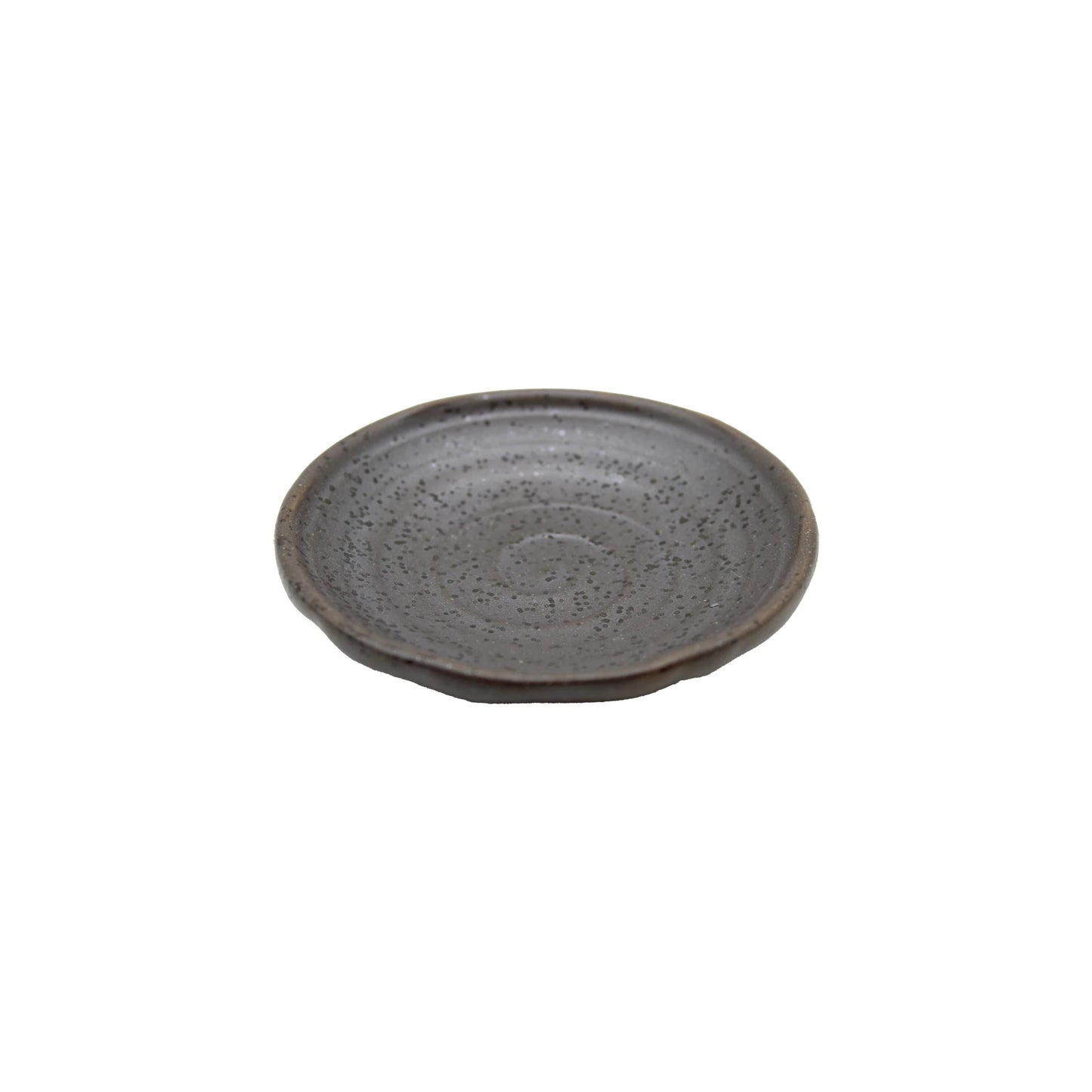 
                  
                    The Soy Sauce Dish - Black Iga Vortex is a small, round ceramic plate featuring a speckled gray pattern inspired by Iga-yaki pottery, shown against a white background.
                  
                