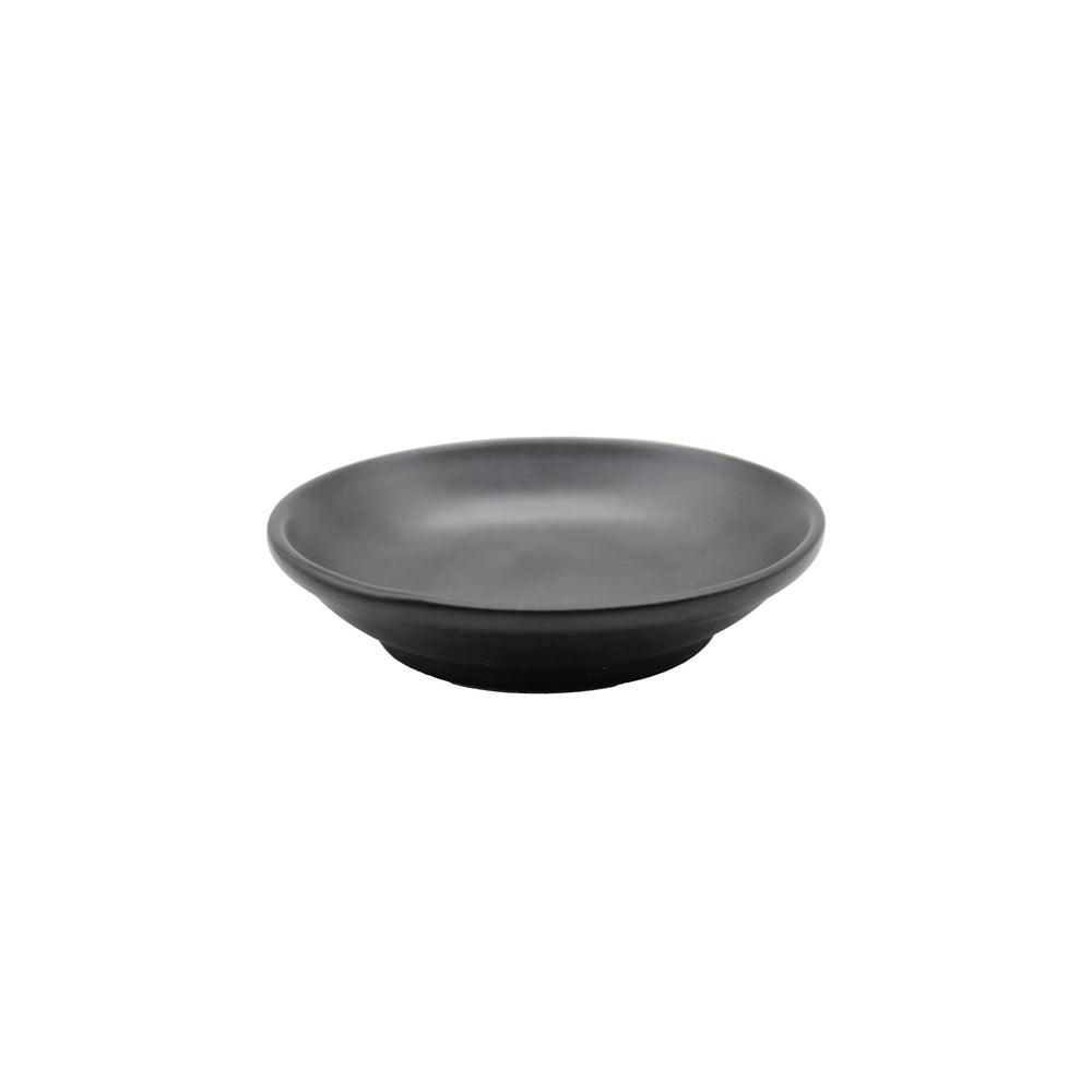 The Soy Sauce Dish - Matt Black is a simple, round dish shown on a white background—ideal for serving pickled vegetables or soy sauce.