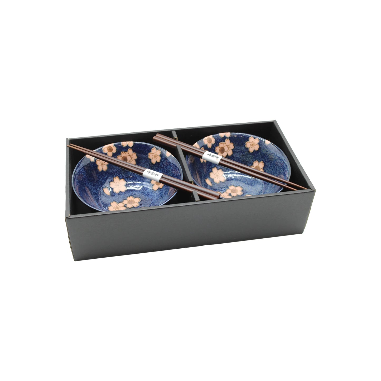 
                  
                    The Cherry Blossom Bowls Boxed Set - Blue with Pink Sakura features two blue bowls with pink sakura designs and two pairs of wooden chopsticks, all presented in a black box.
                  
                