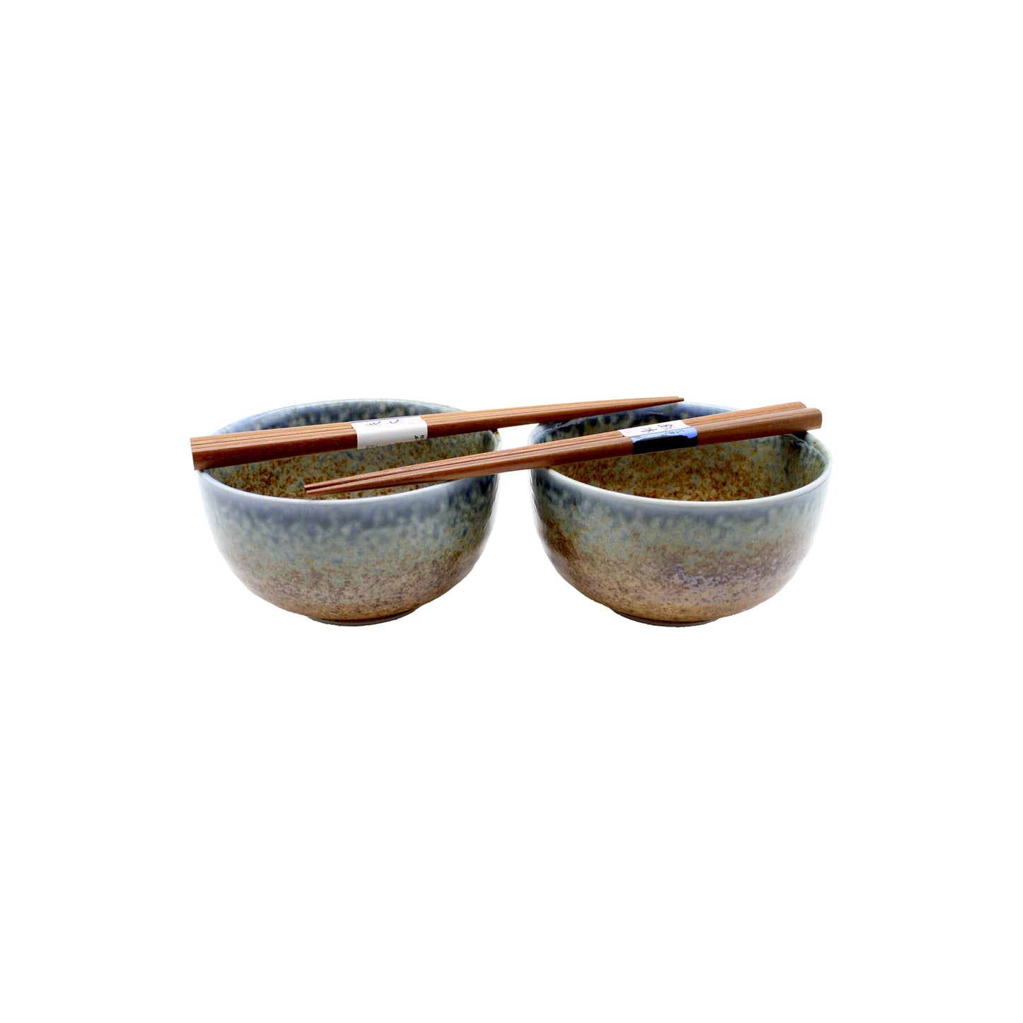 
                  
                    The Aki Bowl Gift Set - Brown & Blue features two ceramic bowls with blue and brown glaze, each with wooden chopsticks, offering a charming rustic Japanese tableware set displayed on a white background.
                  
                