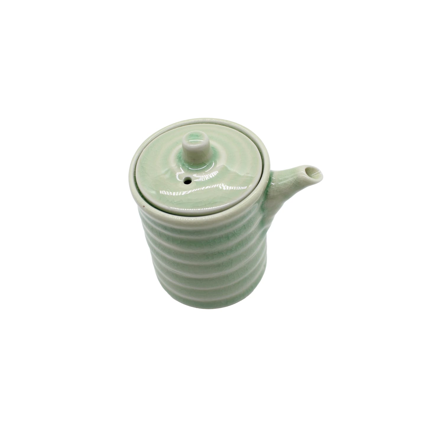 A celadon ribbed Soy Sauce Pourer with matching lid, viewed from above on a white background, showcases the refined craftsmanship of Japanese ceramics.