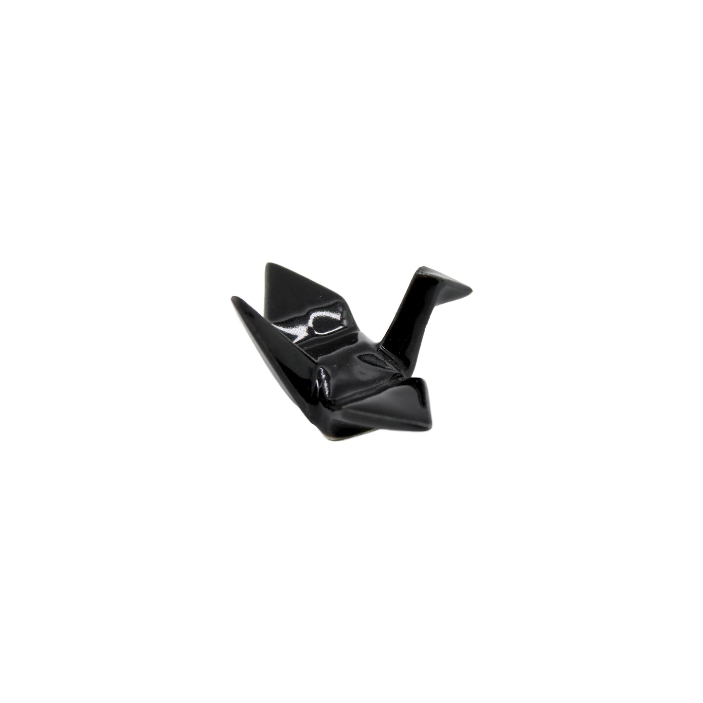 The Chopstick Rest - Origami Crane Black features a small, glossy black ceramic crane design, capturing the elegance of Japanese culture against a plain white background.