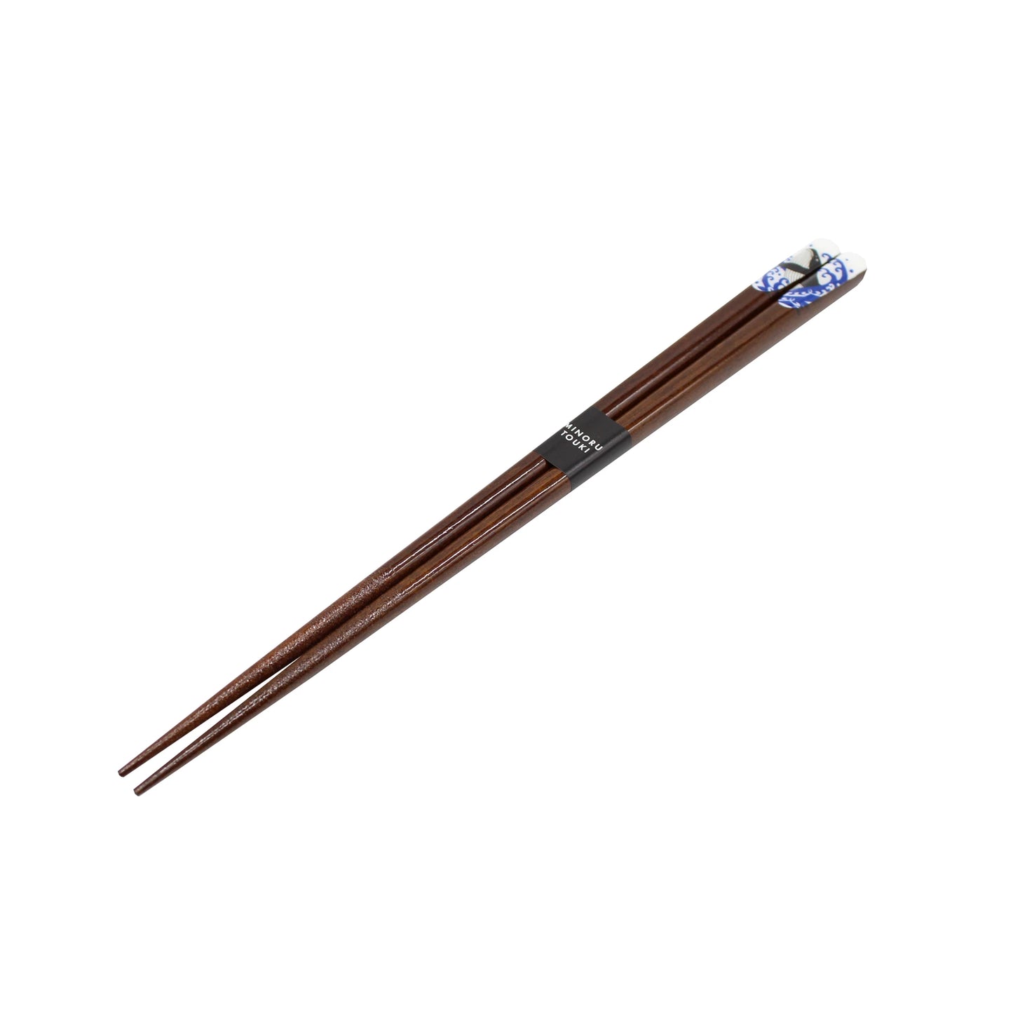 A pair of dark wood chopsticks featuring a whale design, held together by a black paper band—Chopsticks - Dark wood with Whale Design, perfect for enjoying sushi at your next meal.