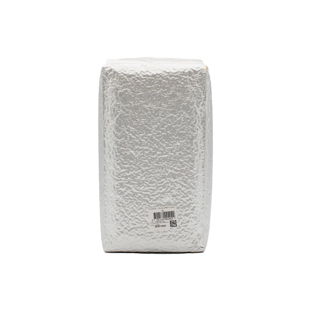 
                  
                    A silver, rectangular package with a textured surface stands upright, featuring barcode and QR code labels—ideal for storing Crispy Roasted Rice, a popular Japanese condiment.
                  
                