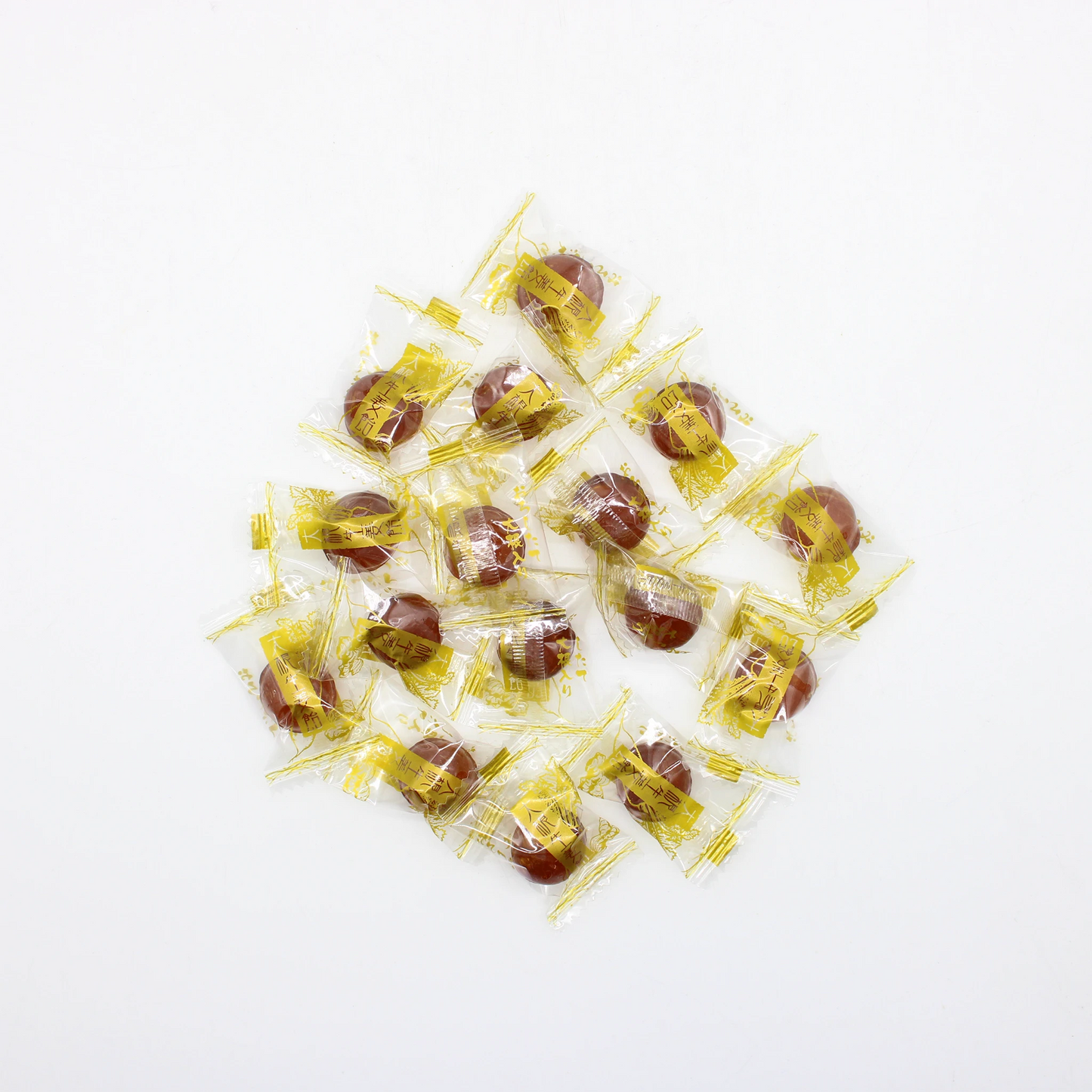 
                  
                    A pack of Japanese Candy - Daikon Radish 140g, featuring unique individually wrapped hard candies in clear plastic with yellow accents, displayed on a white background.
                  
                