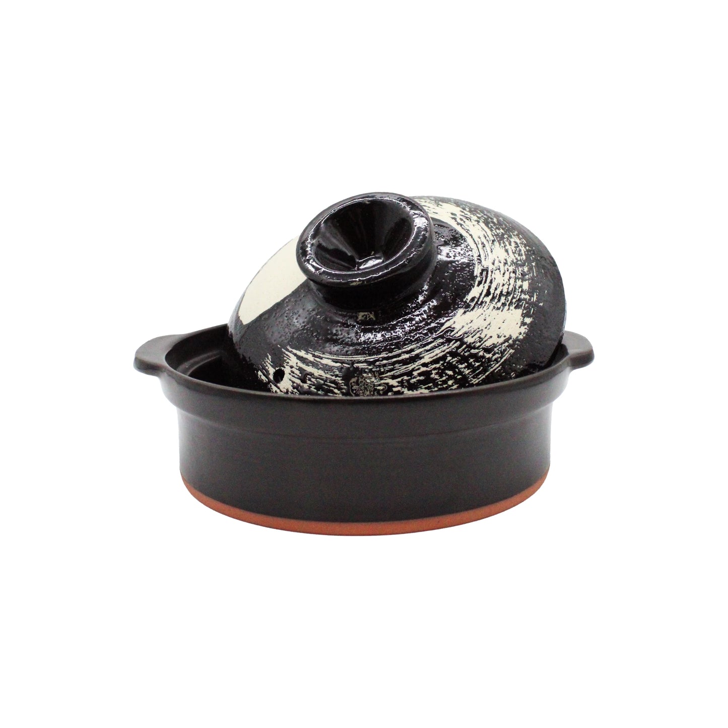 
                  
                    The Black Earthenware Donabe Pot with White Brushstroke Design features a round base, matching domed lid, and is stylish as well as induction compatible.
                  
                