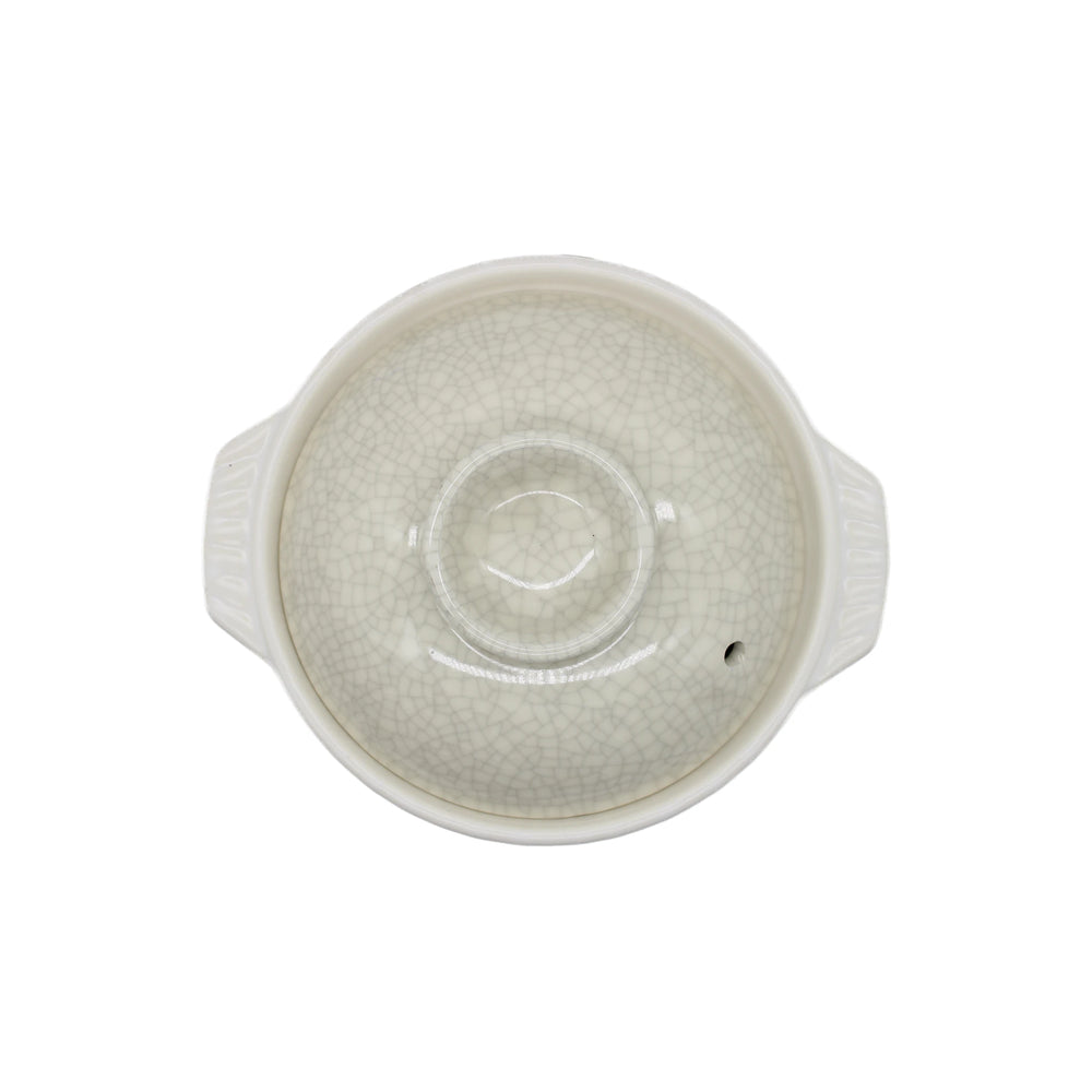 
                  
                    Top view of the Donabe Pot - Cream with Crackle Glaze, round with two small side handles and a light gray crackle glaze, characteristic of Yokkaichi Banko Ware.
                  
                