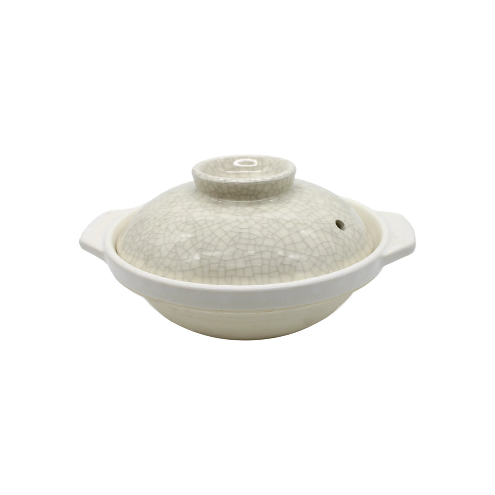 The Donabe Pot - Cream with Crackle Glaze features a lid, side handles, and a signature crackle pattern inspired by Yokkaichi Banko Ware, shown on a plain white background.