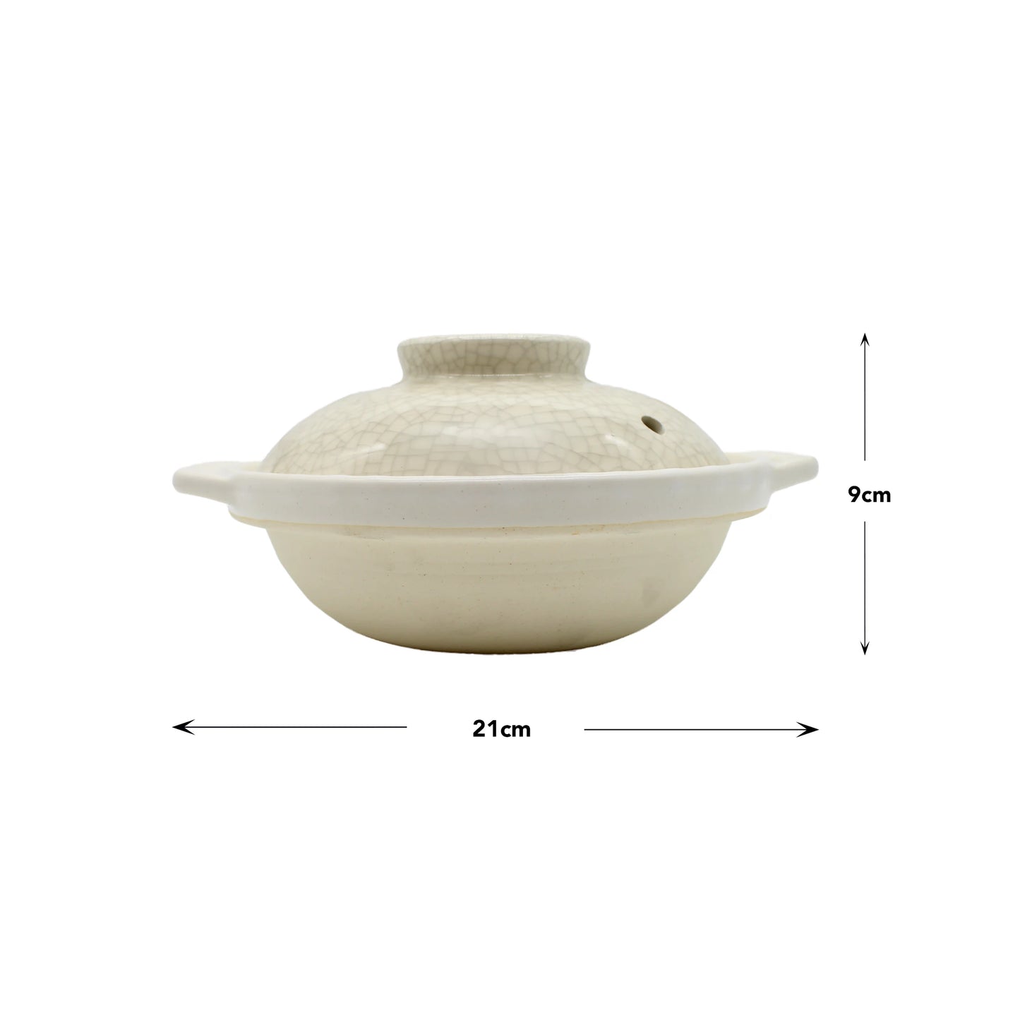 
                  
                    The Donabe Pot - Cream with Crackle Glaze features a lid, side handles, and a crackle glaze finish. It measures 21 cm wide by 9 cm high, as shown by the labeled arrows.
                  
                