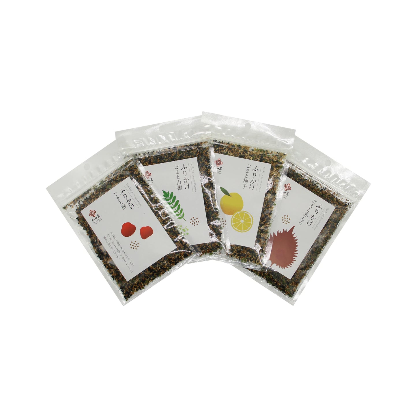 
                  
                    The Wadaman Furikake Set features four clear resealable bags of Japanese furikake seasoning, each adorned with a unique fruit or herb illustration and displayed in a fan arrangement on a white background.
                  
                
